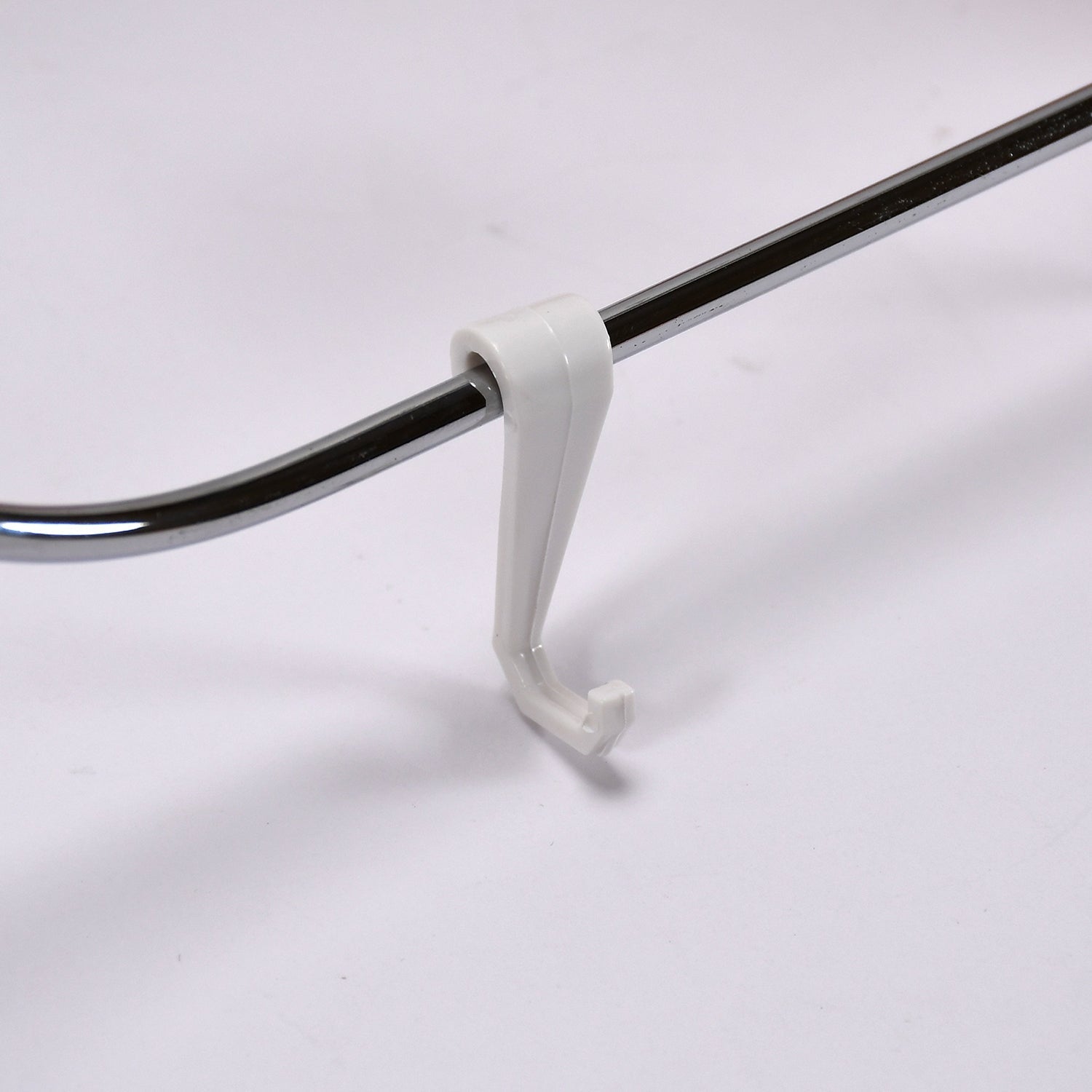 Close-up of the foldable storage rack showing its sturdy ABS and steel construction.