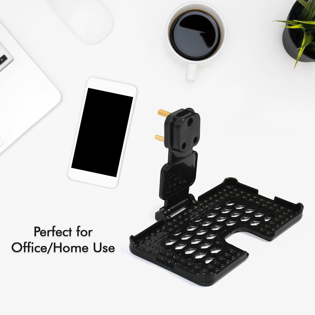 PHOBIA black mobile charging wall holder securely installed on a power socket.