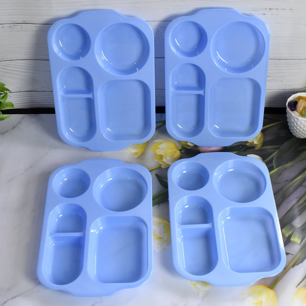Family enjoying a happy meal served on colorful 5-compartment food plates.