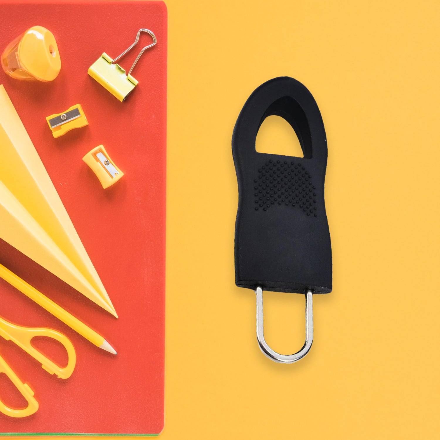 The robust Zipper Pull Tab enhancing the functionality of a jacket zipper for easier use.
