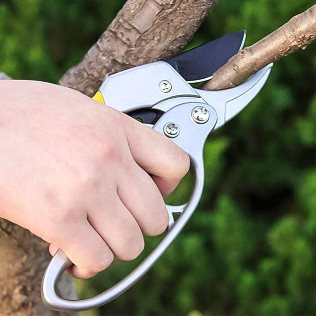 Pruning shears tool resting on garden deck showing sturdy construction