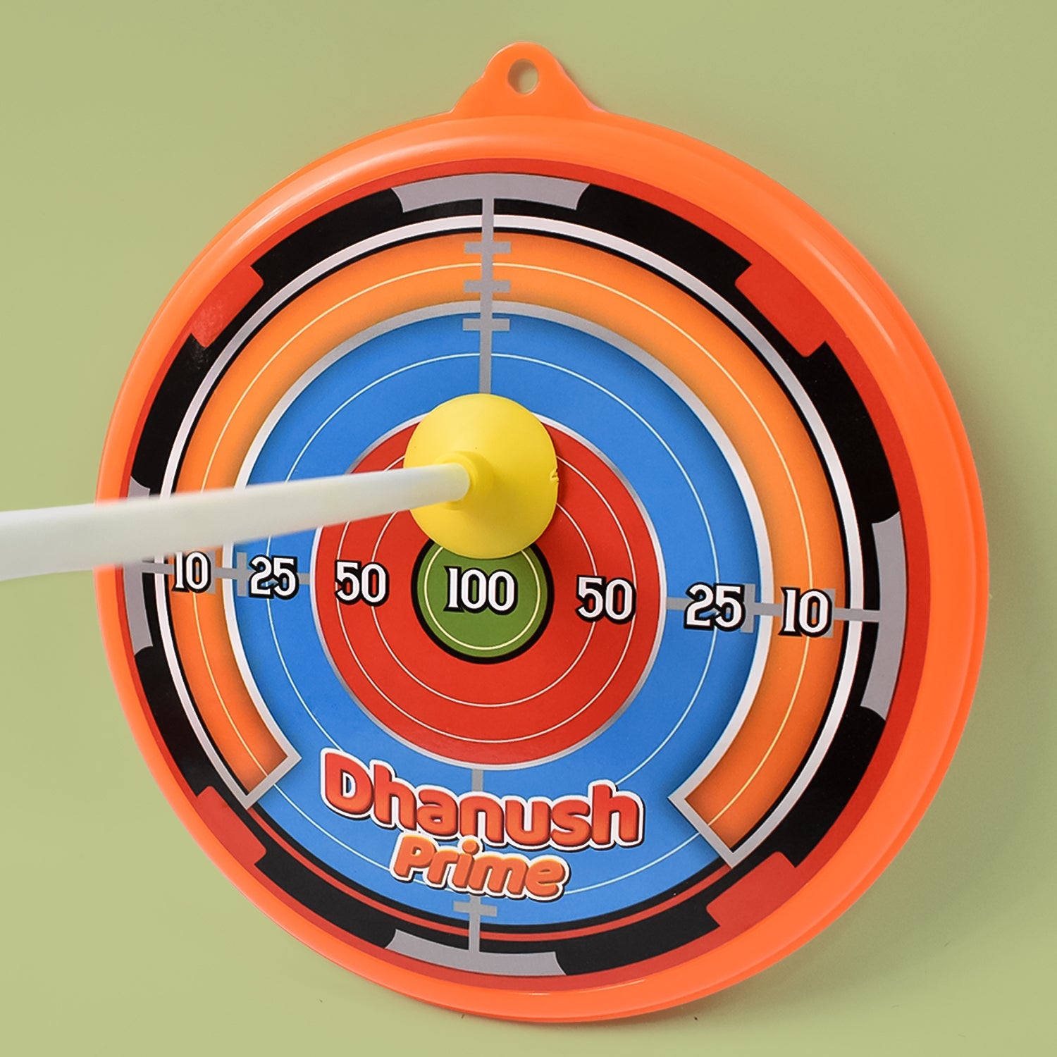 The Kids Archery Set laid out, showcasing the durable plastic bow and arrows with a red and blue target, ideal for play.