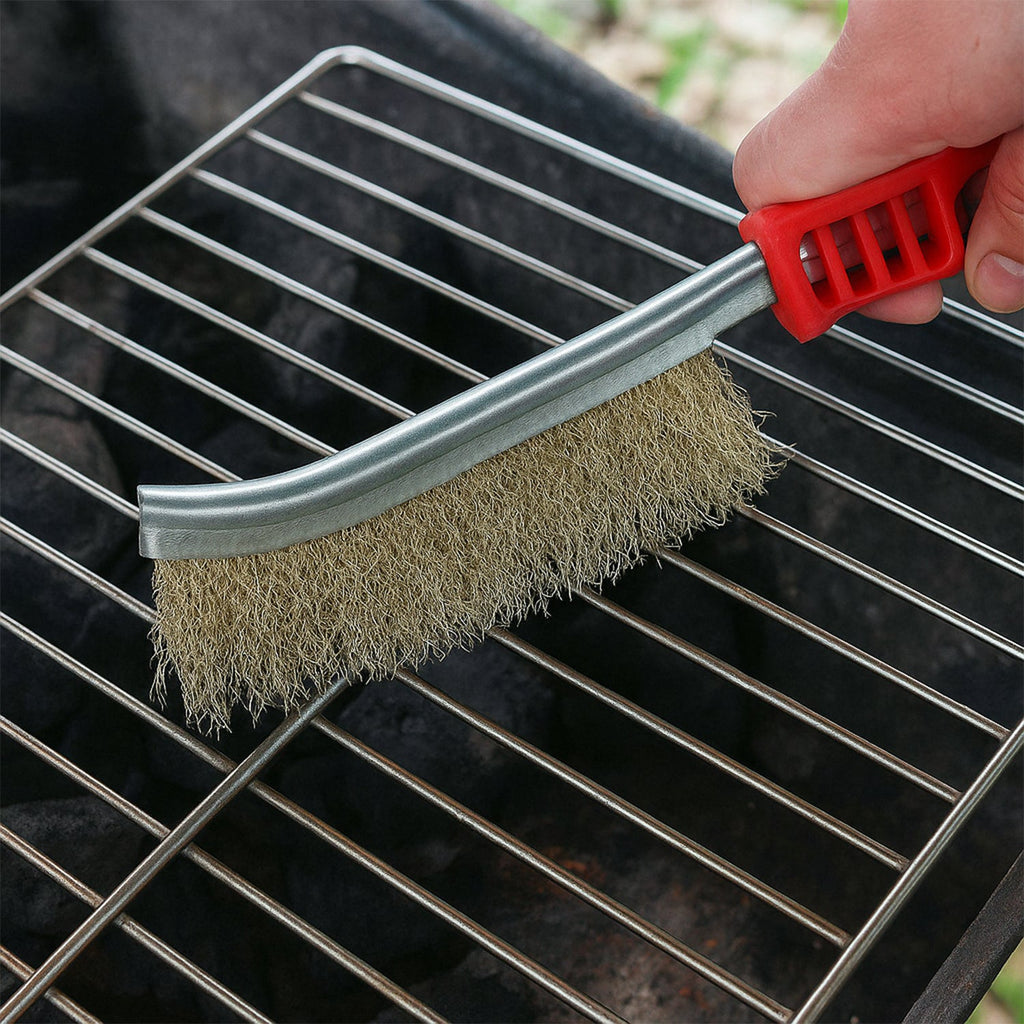 The versatile stainless steel wire brush effectively removing grime.