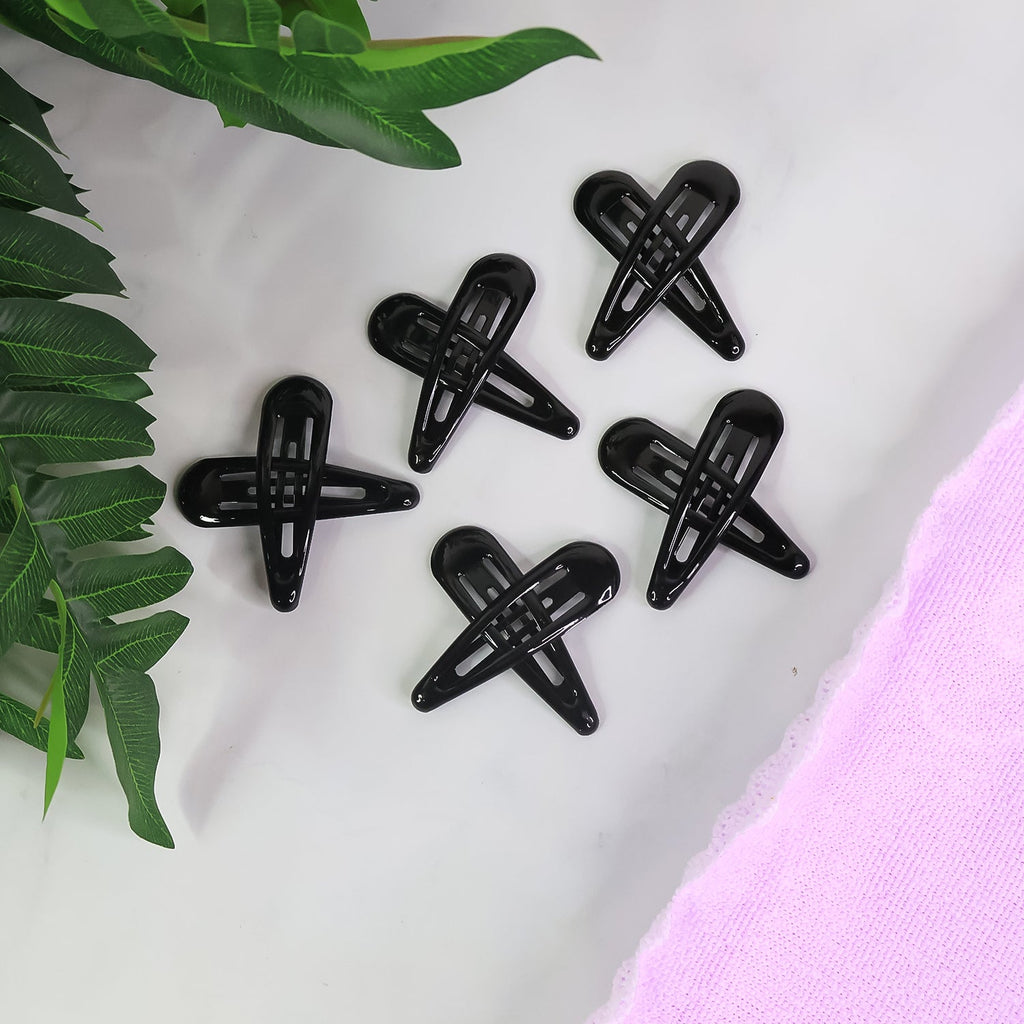 Matte finish metal hair clips arranged in pastel and bold shades