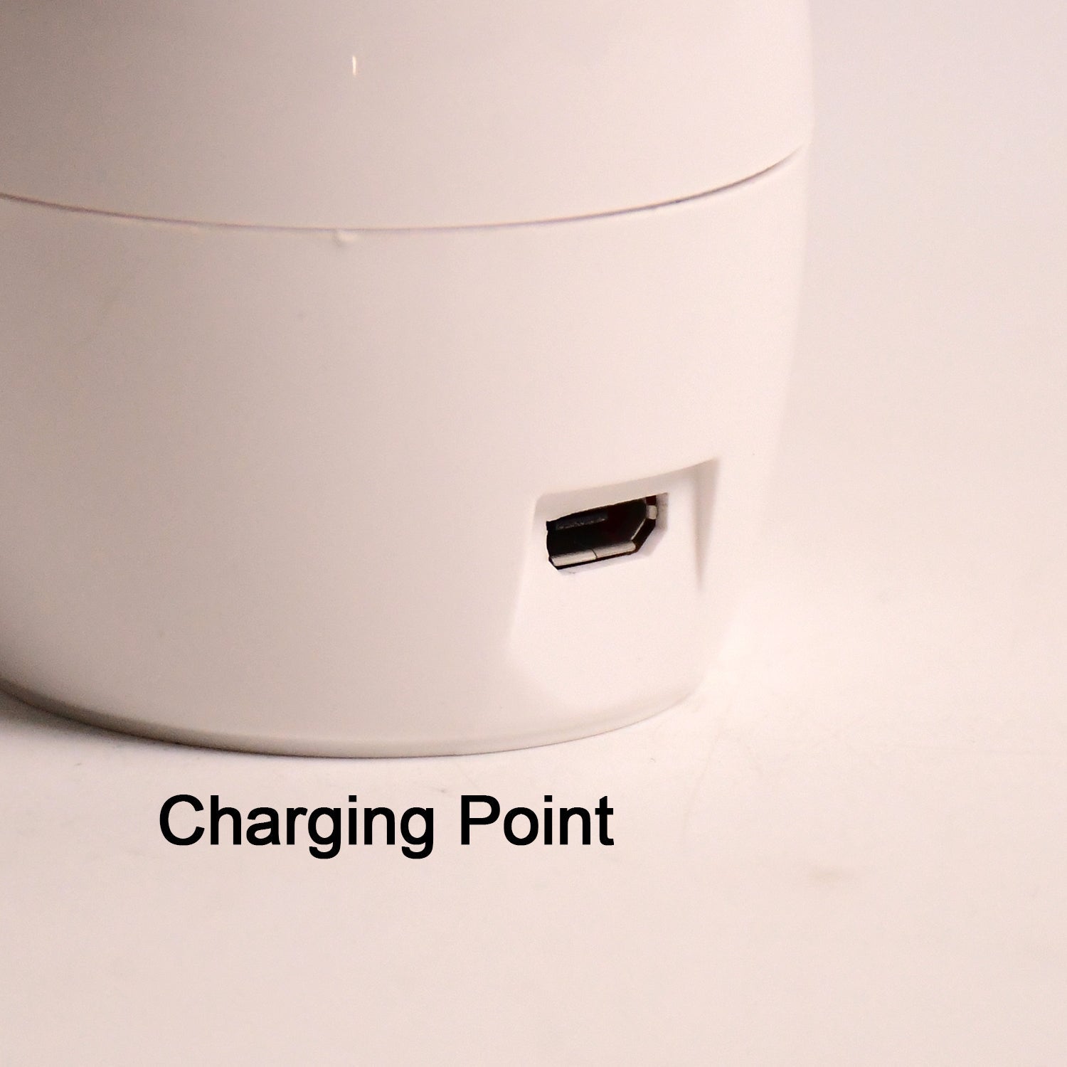 Side angle of plug-in LED nail dryer showing compact design