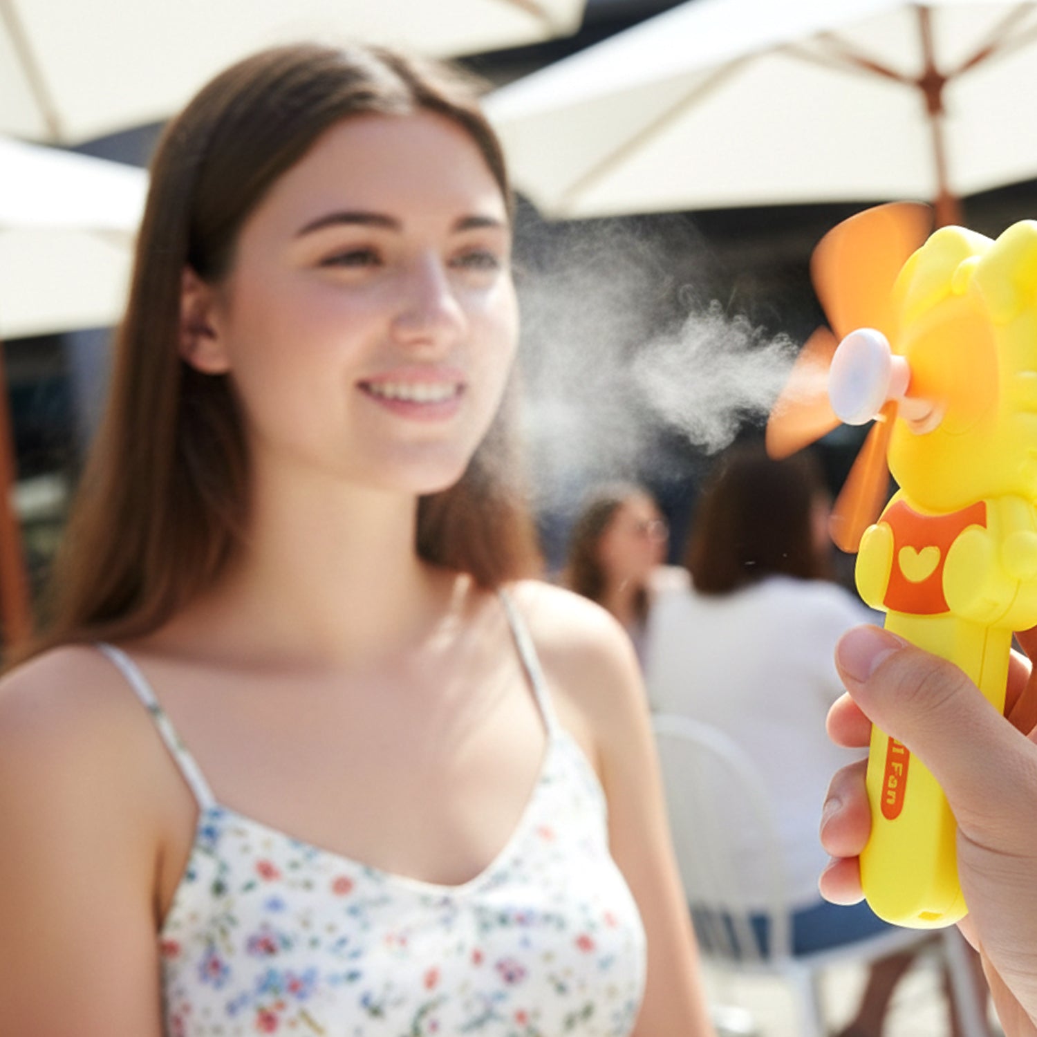 Mini portable fan toy with easy push-action manual operation