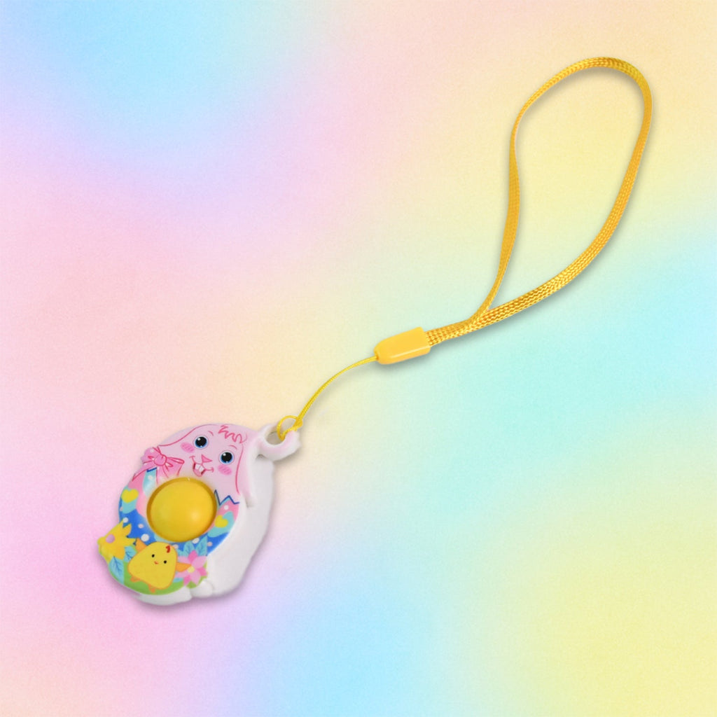 Close up of relaxing silicone pop bubble on chick-shaped fidget toy