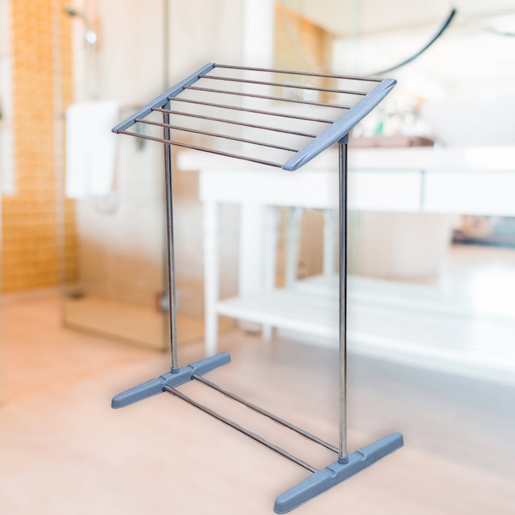 Mobile towel rack positioned indoors, ideal for drying delicate items.