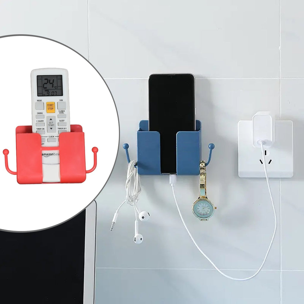 Wall mounted phone charging dock and remote control holder in a modern home.