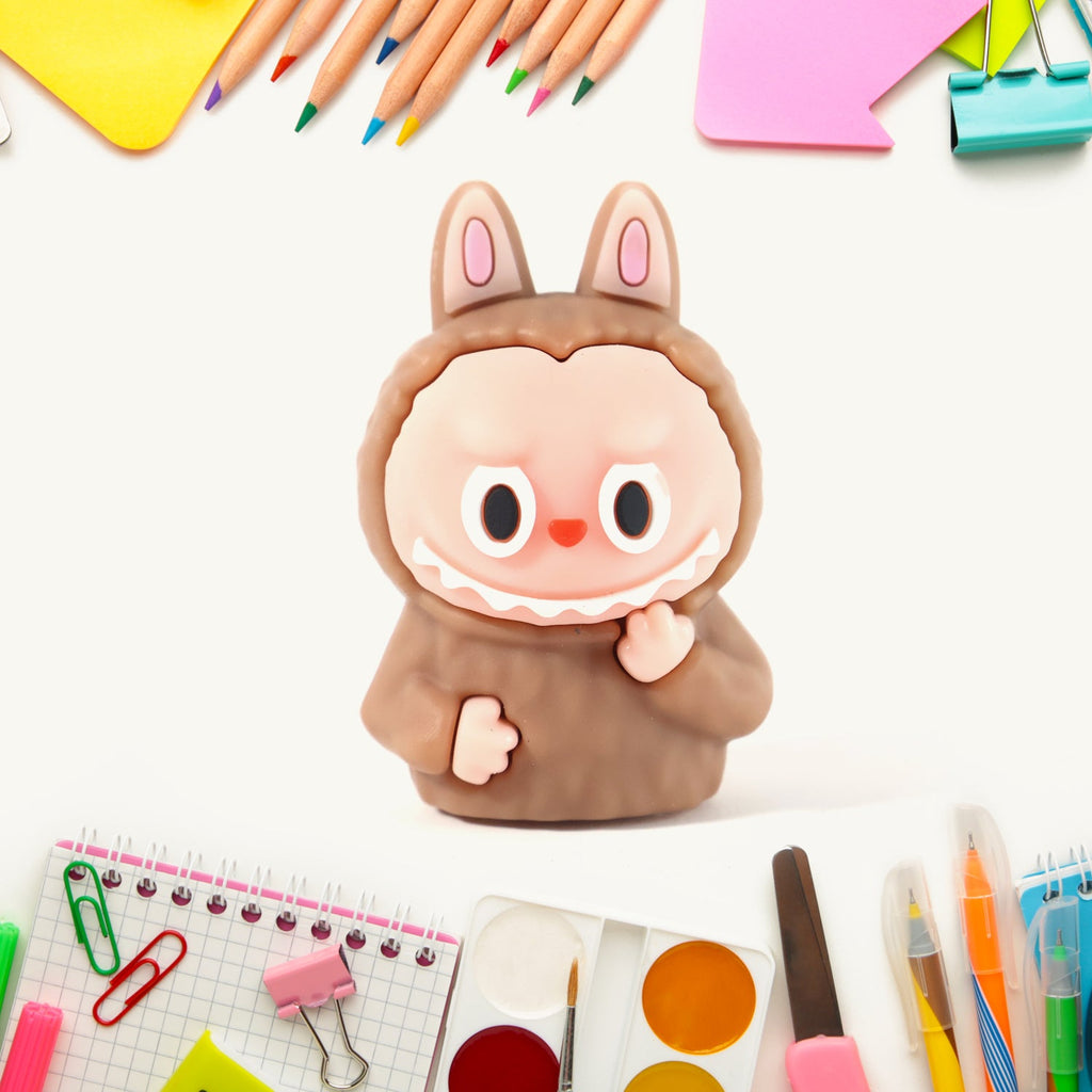Child using cartoon pencil sharpener inside eraser for school