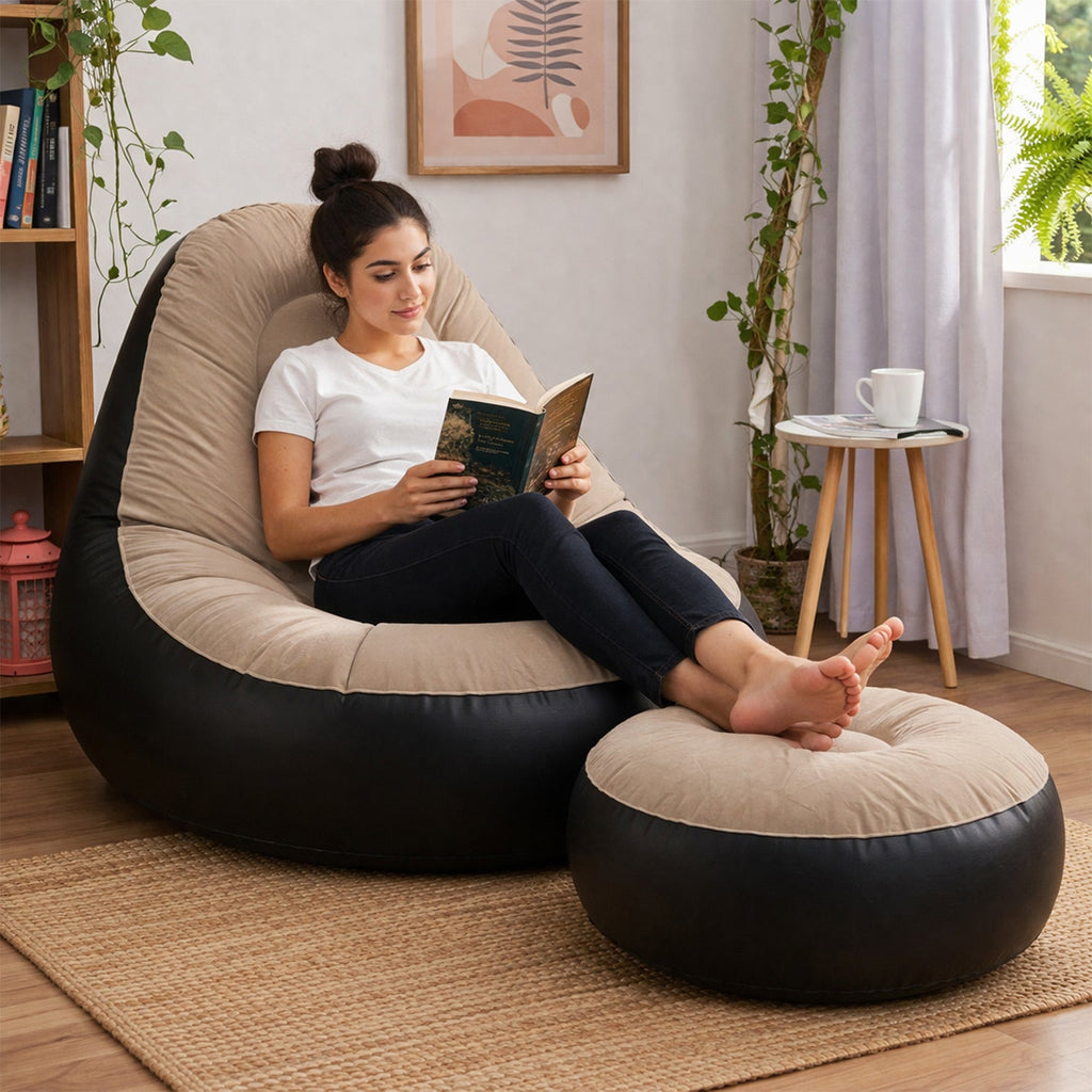 Close-up of inflatable sofa chair and footrest with electric pump