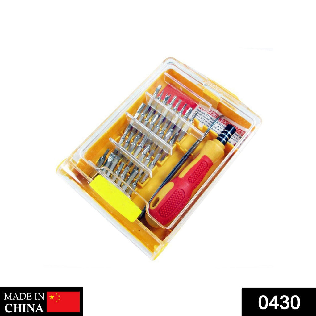 Compact magnetic screwdriver set with magnetic bit holder and various bits.