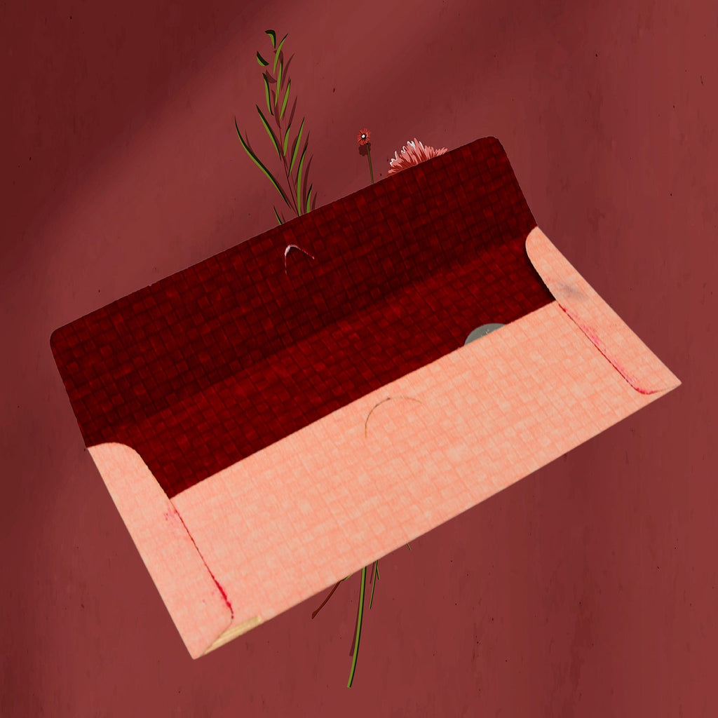 Open view of a wedding gift envelope showing space for Indian currency notes.