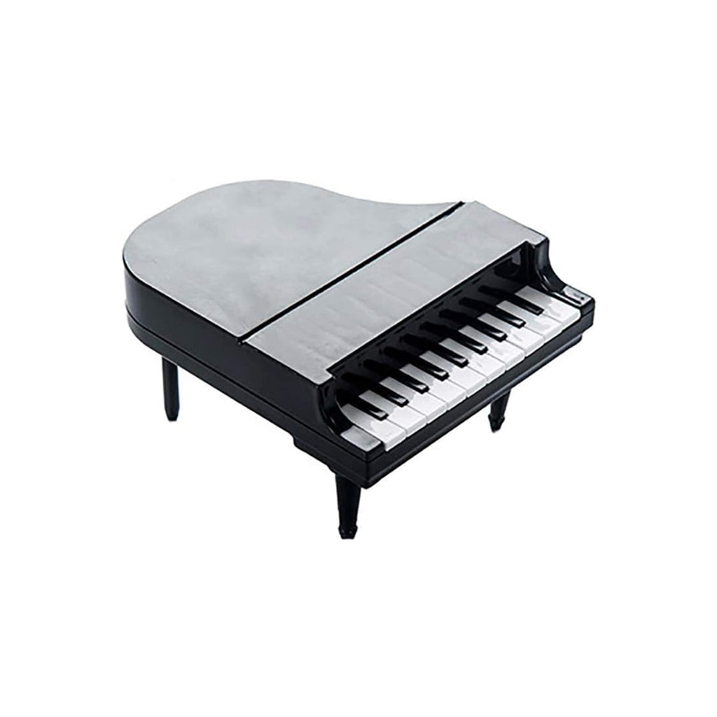 Guests enjoying a party with the charming piano fruit forks, perfect for appetisers.