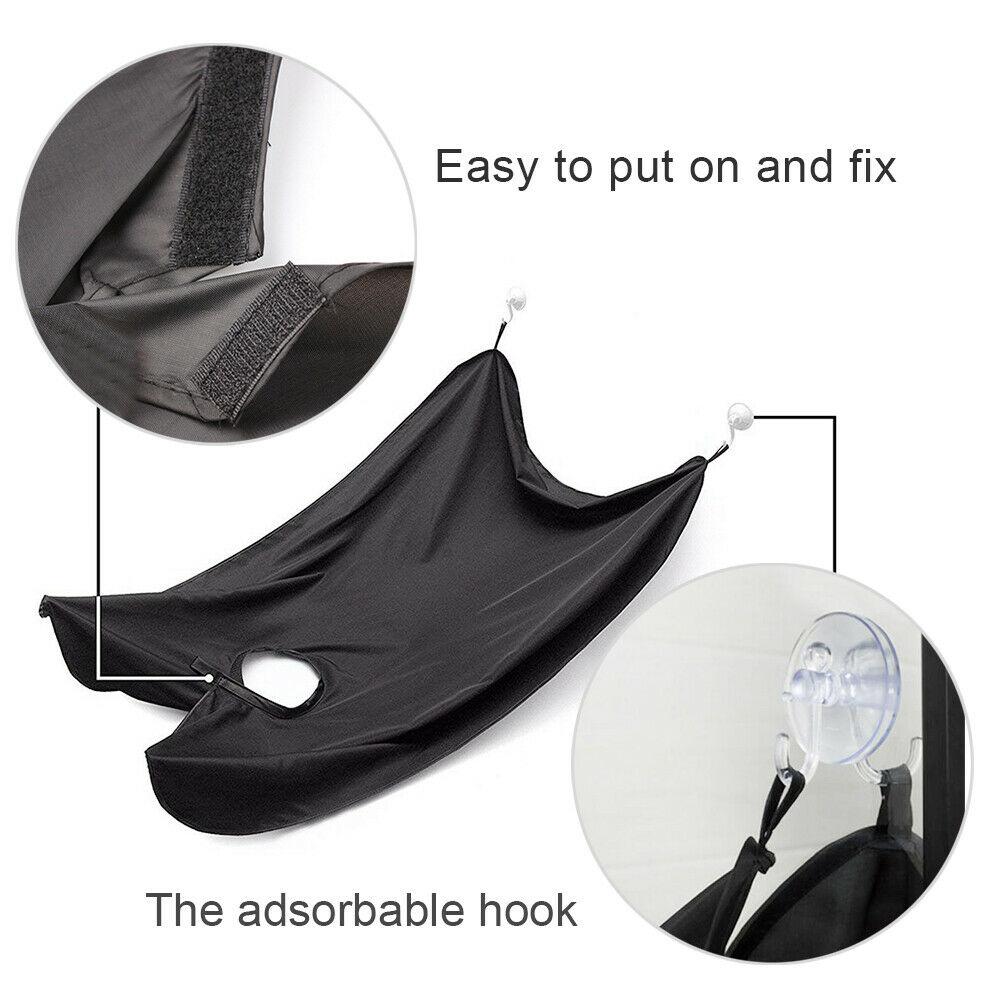 Beard apron efficiently capturing all hair clippings during a precise beard trim.