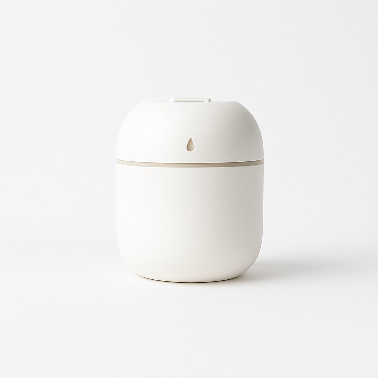 Mini USB Humidifier releasing a visible cool mist plume.