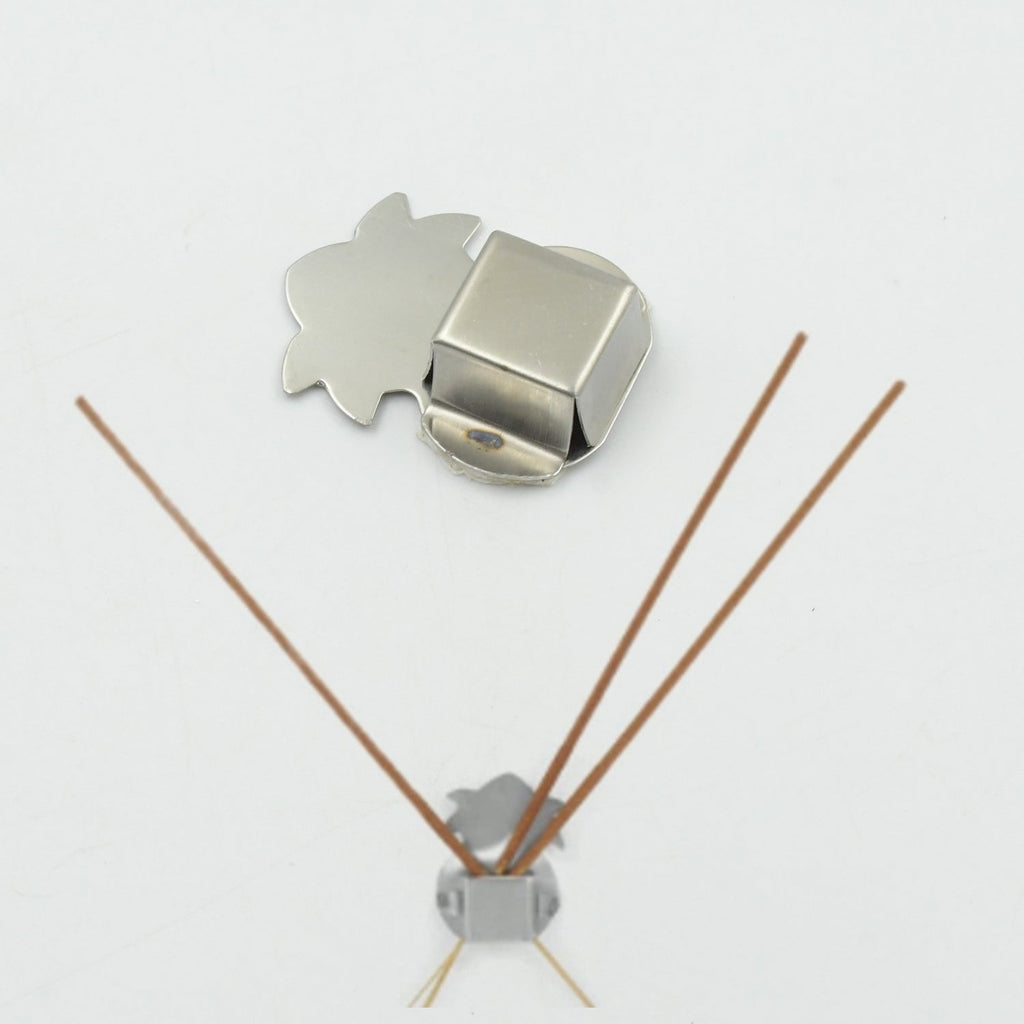 Complete pack of 12 self-adhesive stainless steel agarbatti stands.