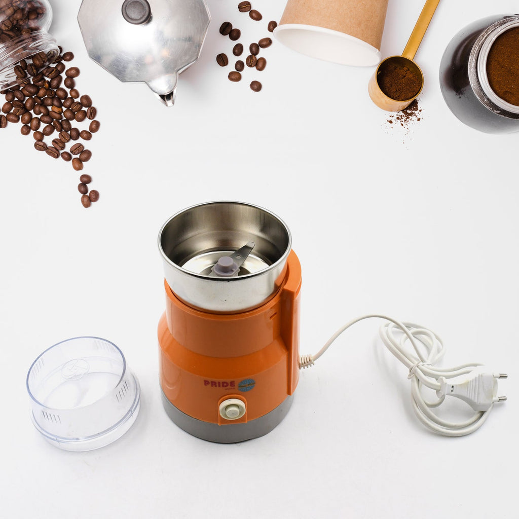 Small kitchen grinder with transparent lid for easy monitoring.