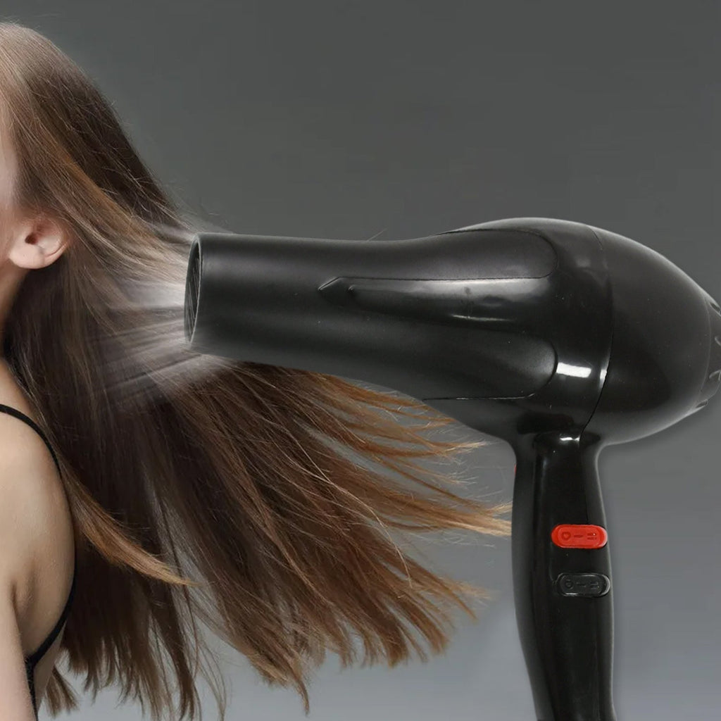 Professional hair dryer with 1800W power and sleek design.