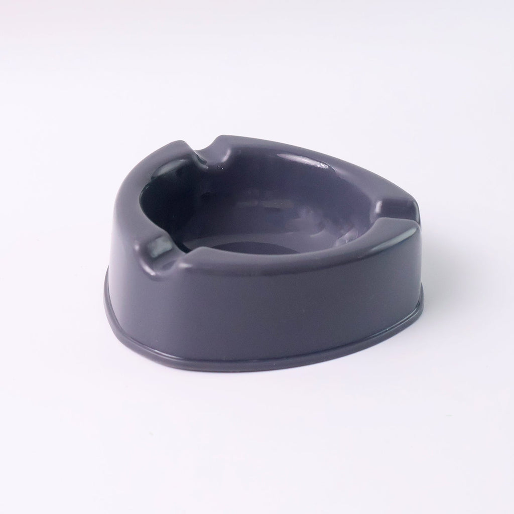 Unbreakable grey plastic ashtray with smooth surface for easy cleaning