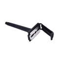 Shaving razor for men with a black plastic grip handle on a light background.