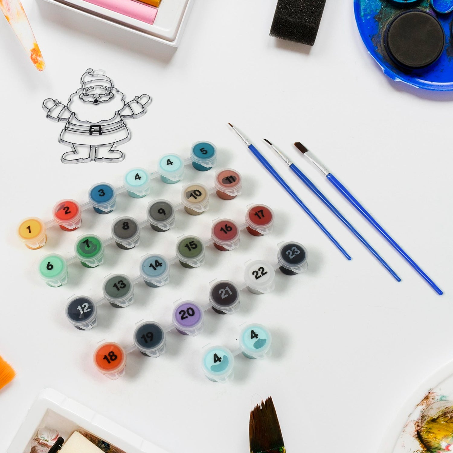 An adult enjoying the mindful process of painting by numbers with the 24-color kit.
