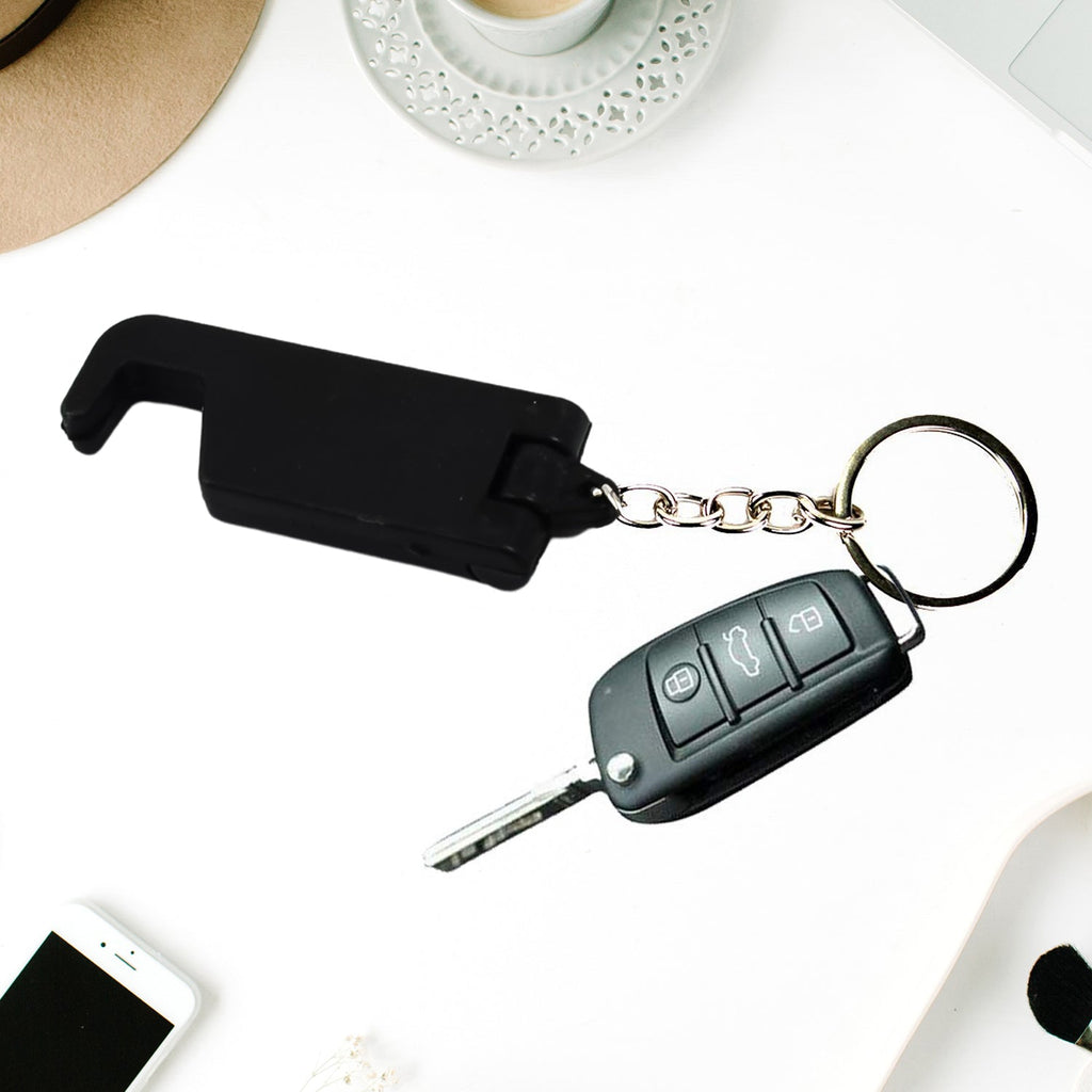 Assortment of plastic keychain mobile stands in various colors.