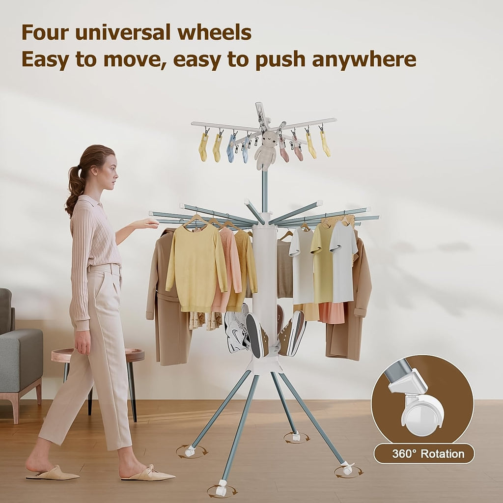 Clothes drying rack in use with multiple hanging garments drying