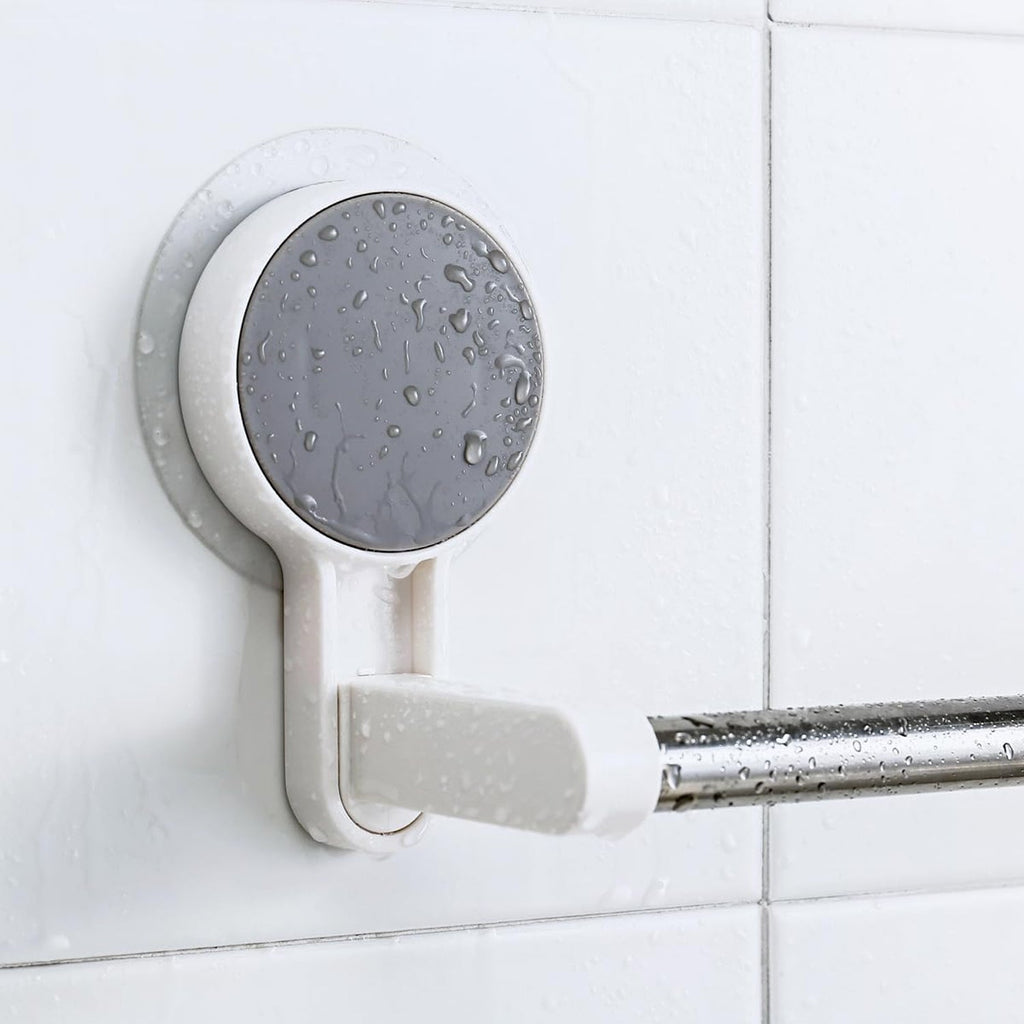 Removable and reusable self-adhesive towel rod mounted on tile wall