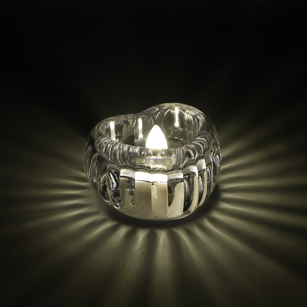 6-piece set of LED crystal flameless tealight candles glowing warmly