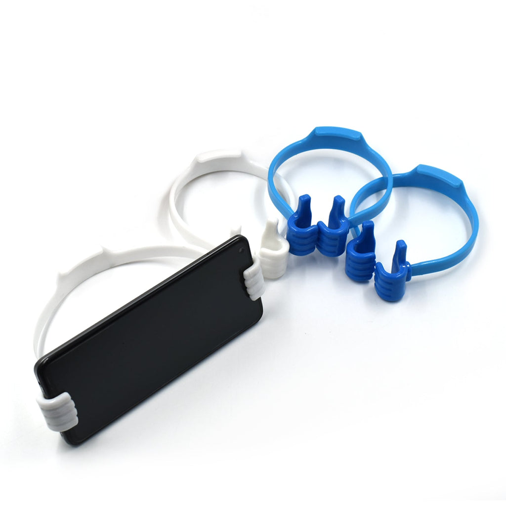 A smartphone resting comfortably in the hand-shaped mobile stand on a clean surface.