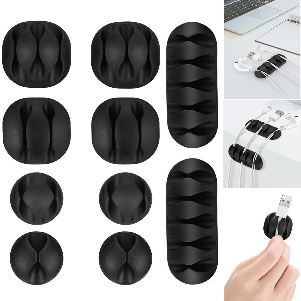 A set of 10 black cable organiser clips ready for use in home or office cable management.