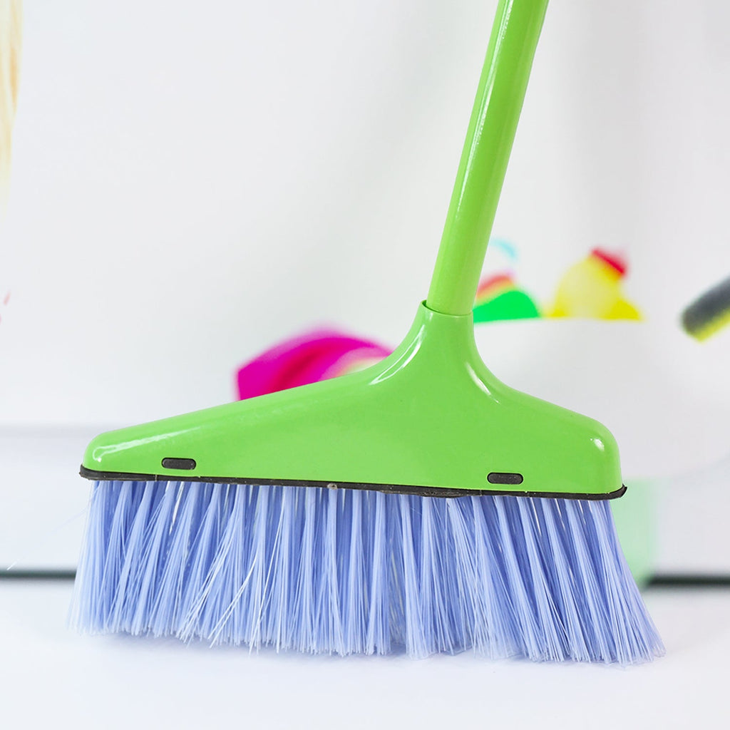 Dustpan and brush set showcasing adjustable handle and foldable dustpan features