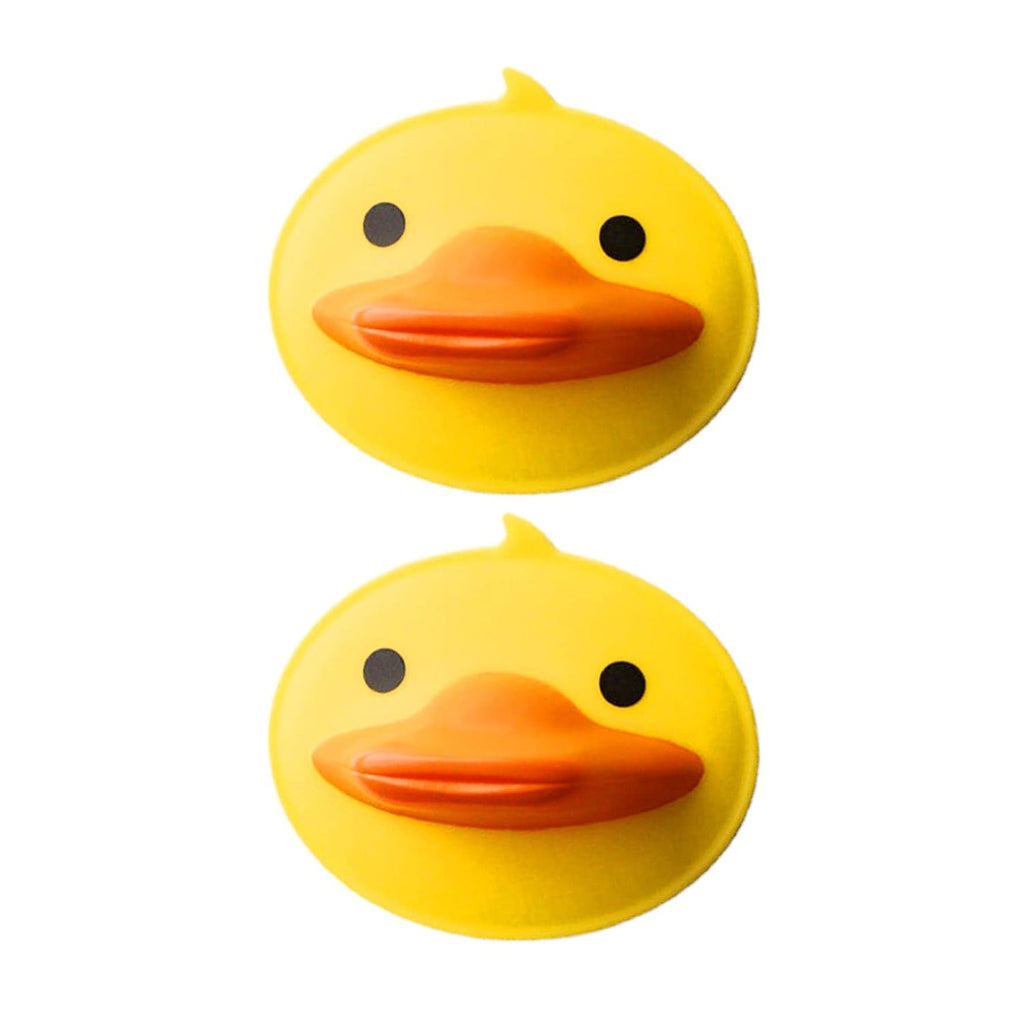 Duck-shaped heat protection silicone hot pot holder mat on kitchen counter