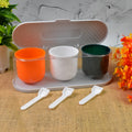 Multicolor 3-grid spice box with individual spoons for organised masala storage.