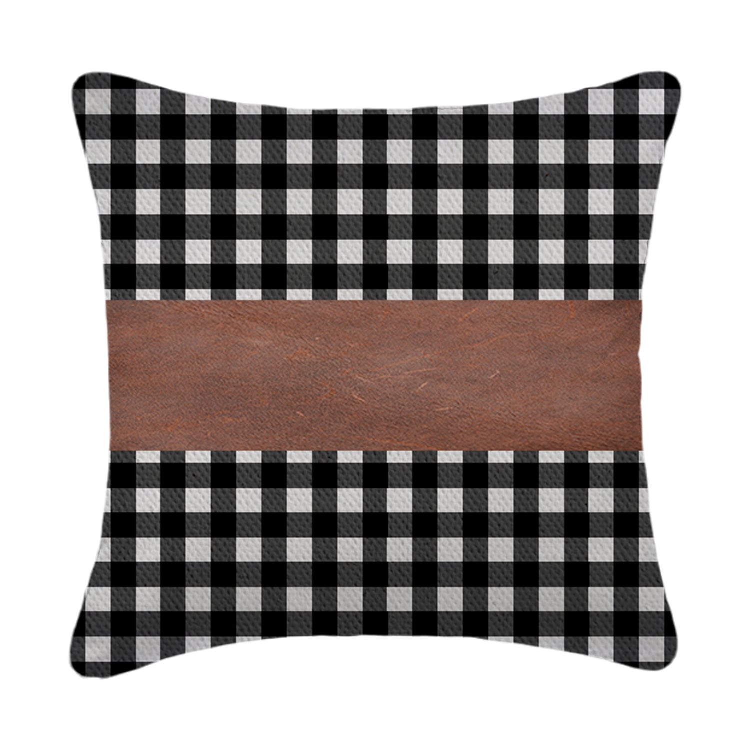A set of contemporary leather pillow covers arranged on a comfortable armchair.
