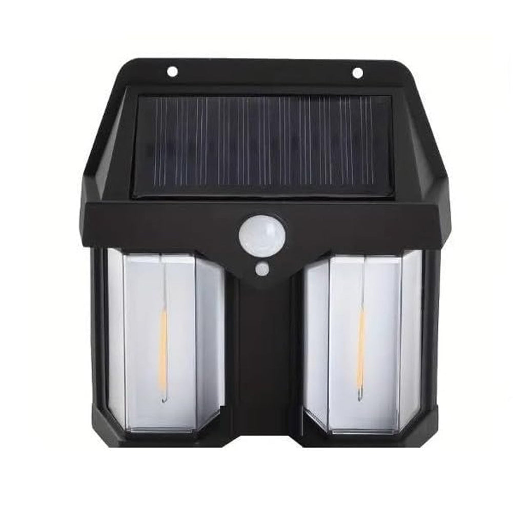 Solar wall light shown to scale on a brick wall, highlighting its compact size.