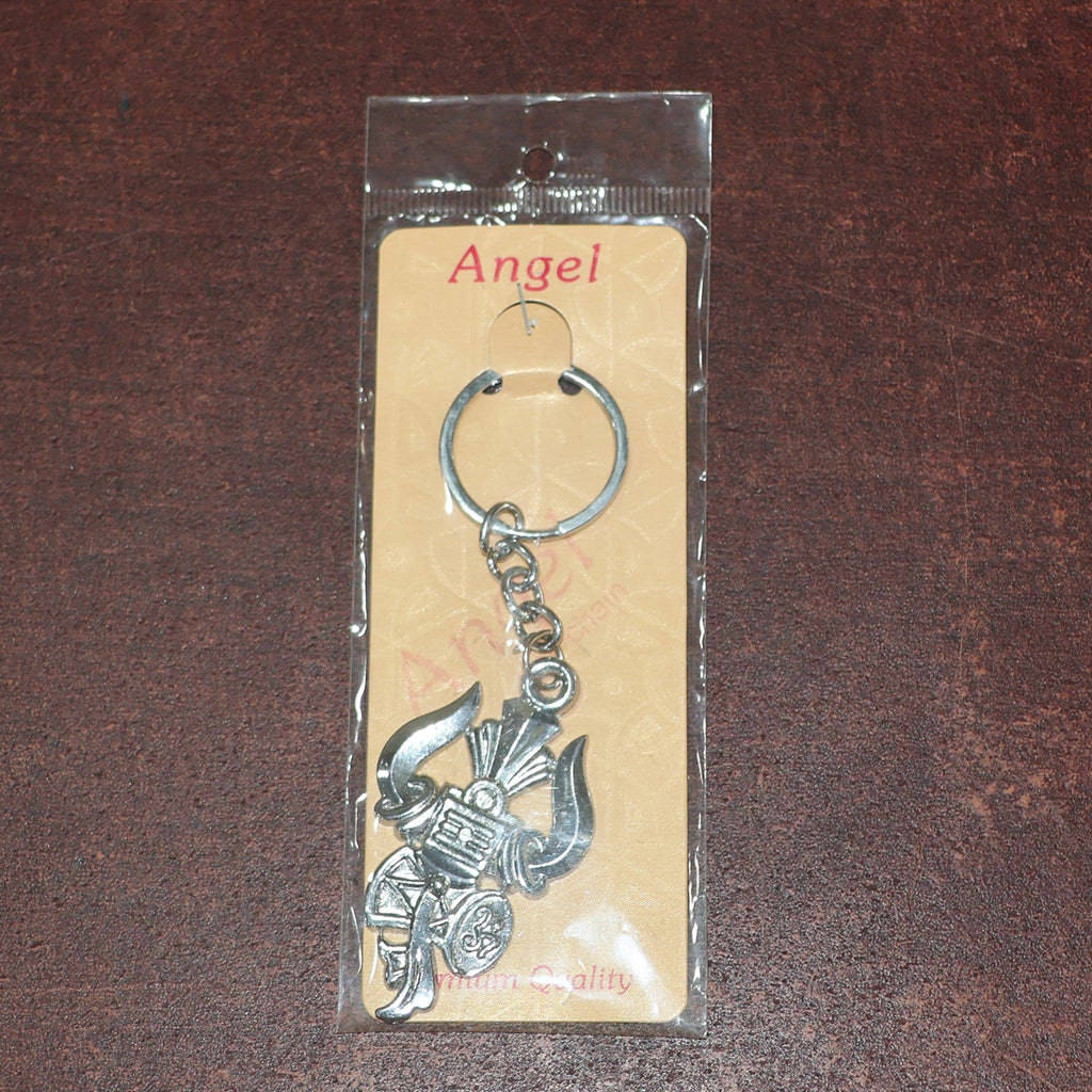 Metal keychain displaying detailed craftsmanship of Trishul and Damru symbols