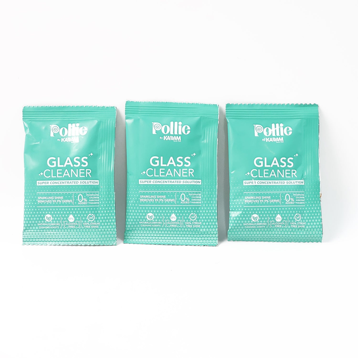 Cleaning kit components including refill sachets and spray bottle for glass surfaces.