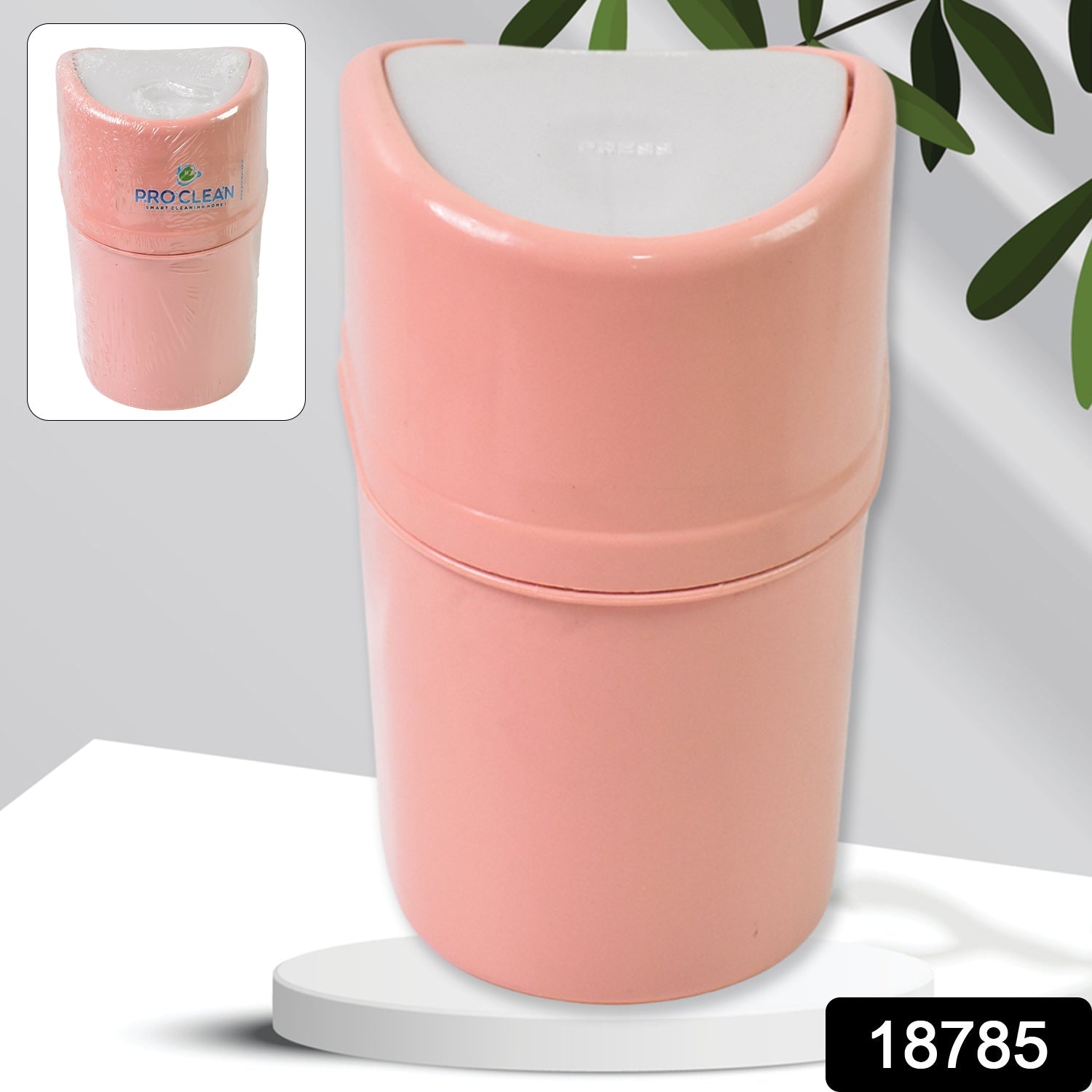 Side view of the compact plastic mini dustbin with its swing lid closed.