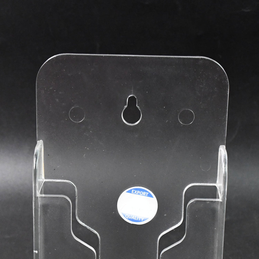 Durable ABS mobile holder securely displaying a phone on a bedroom wall.