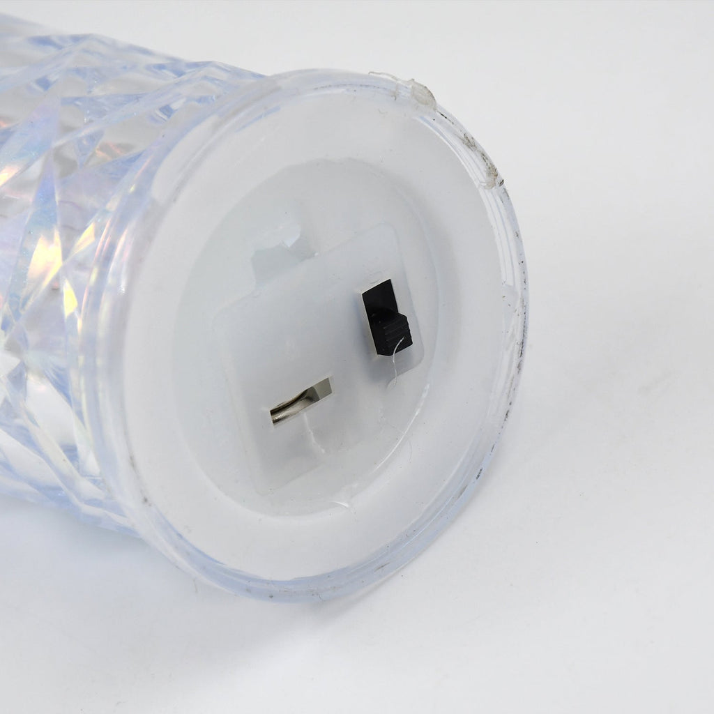 LED tealight candle in a decorative setting, enhancing the festive atmosphere.
