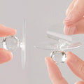 Sparkling crystal cabinet knob with a diamond design on a clean white background.
