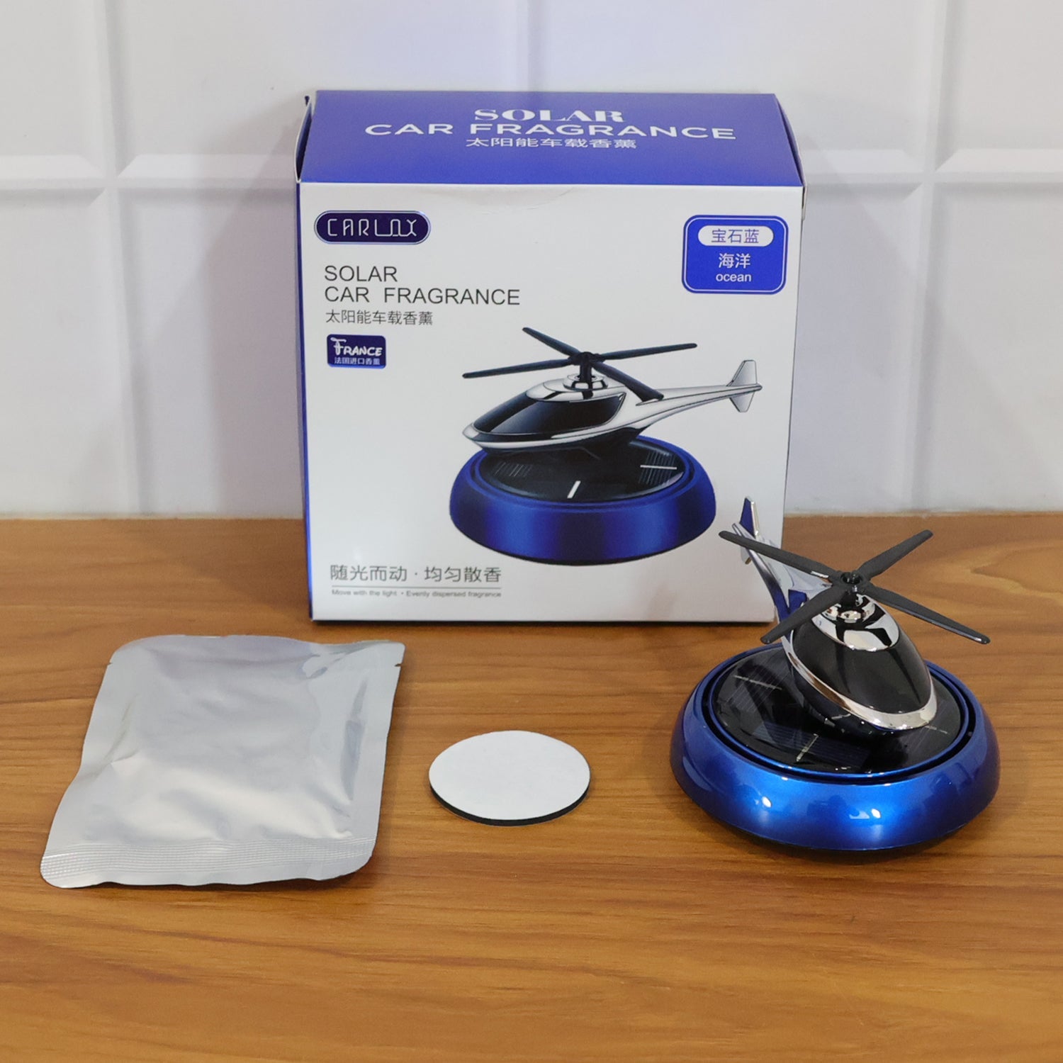 Stylish rotating helicopter air freshener enhancing car dashboard decor