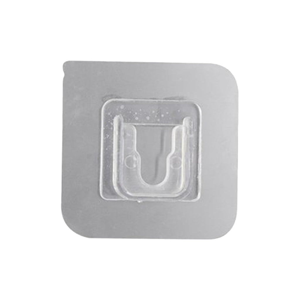 Transparent self-adhesive wall hook ready for easy peel-and-stick application.