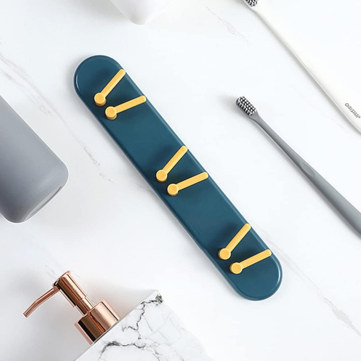 Efficient wall-mounted toothbrush holder with shelves and hooks for Indian bathrooms.