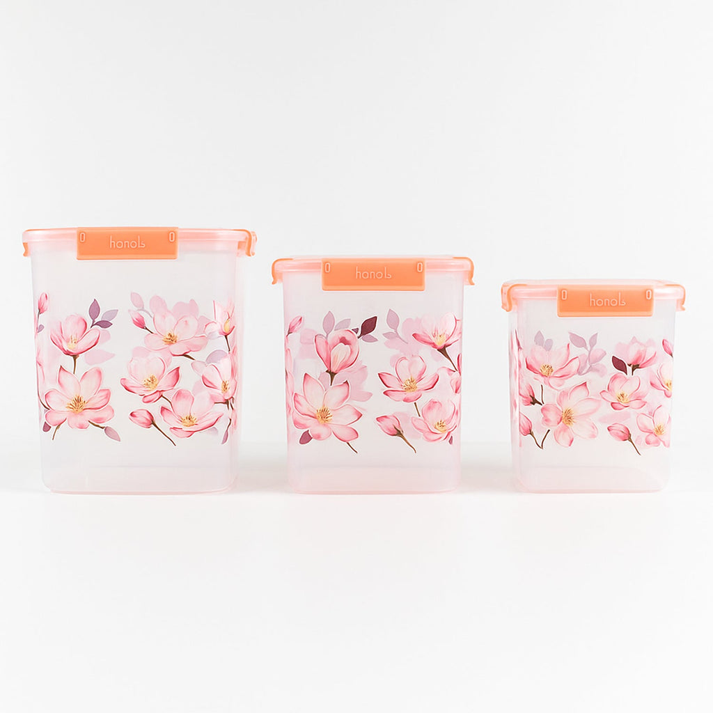 Stackable floral food storage container set with transparent bodies.