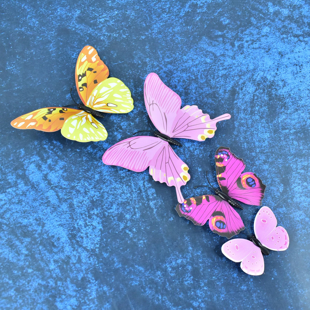 Assorted sizes of colorful 3D butterfly wall decals for decoration