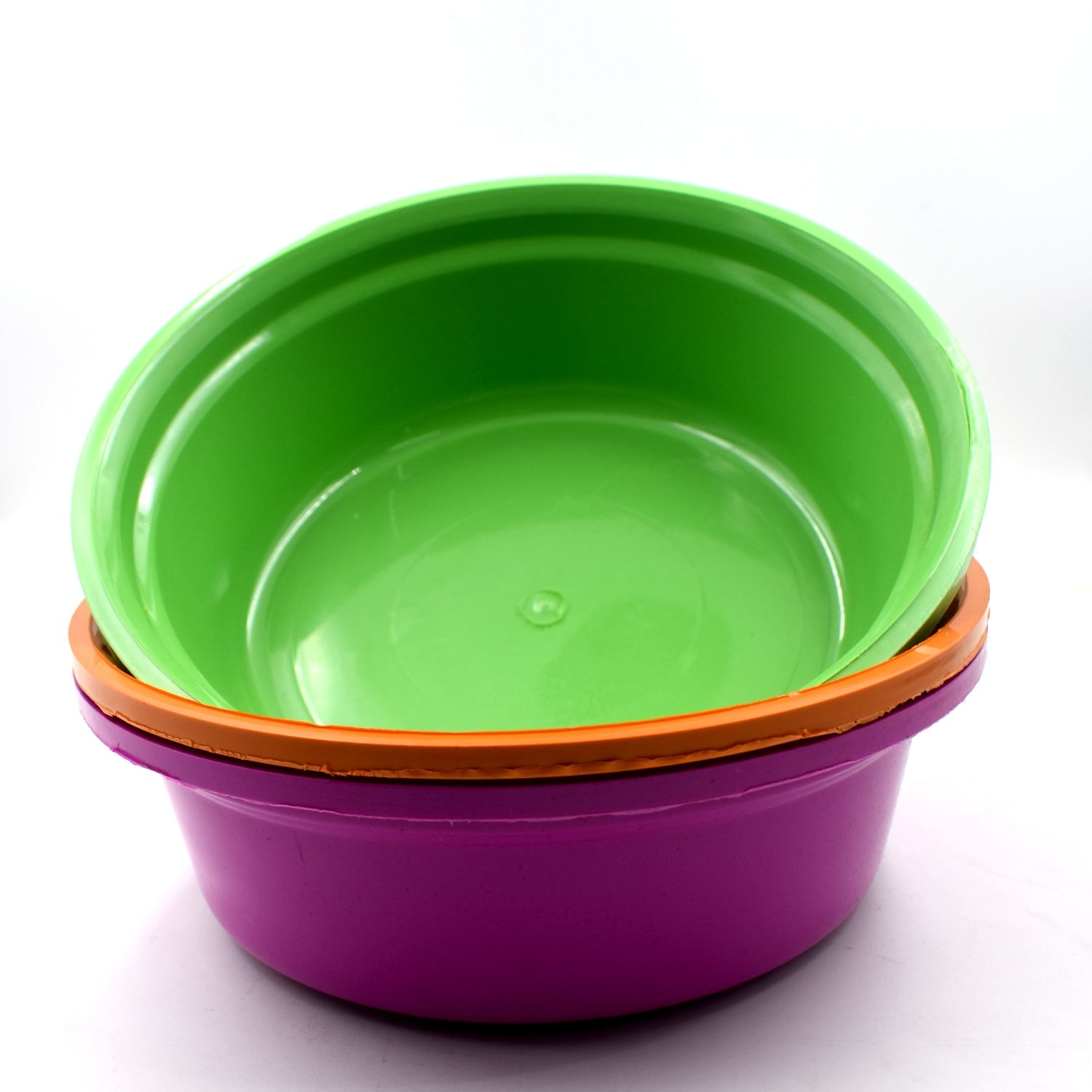 Lightweight plastic bowls stacked neatly, demonstrating space-saving storage.