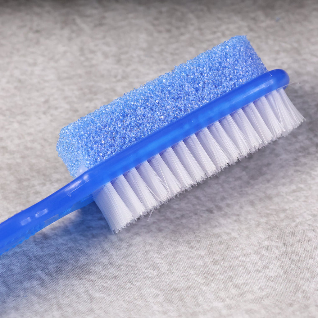 Foot scrubber brush being used in shower for daily foot care